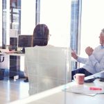 Group of people talking in the office